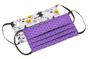 Handmade Halloween cloth face masks with witches and pumpkins on gray purple fabric